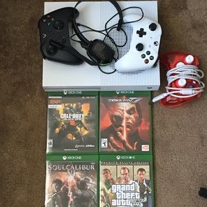 Xbox 1s and 4 games. No power cord but $8 at walma